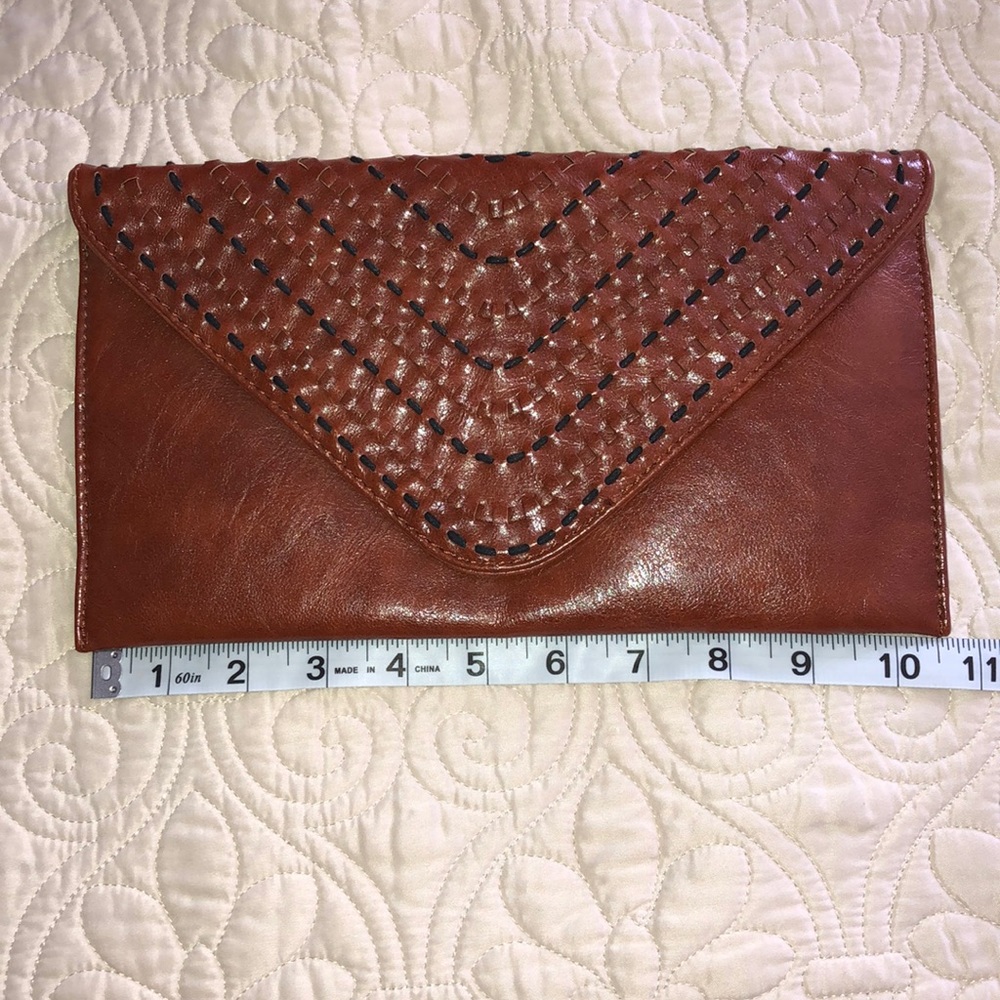 Brown leather clutch